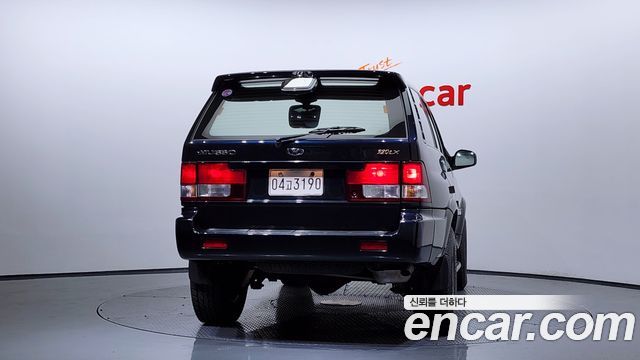KG Mobility Musso 2000 — photo 4