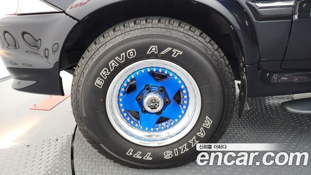 KG Mobility Musso 2000 — photo 5