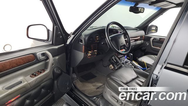 KG Mobility Musso 2000 — photo 10