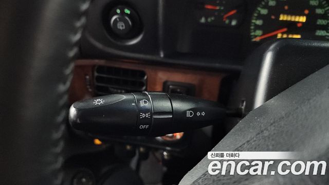 KG Mobility Musso 2000 — photo 15