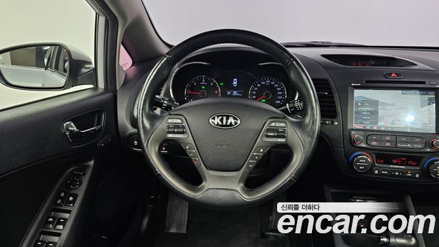 Kia K3 2014 — photo 13