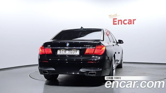 BMW 7-Series 2011 — photo 4