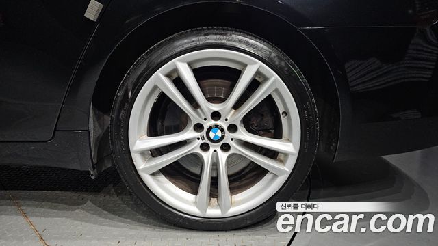 BMW 7-Series 2011 — photo 5