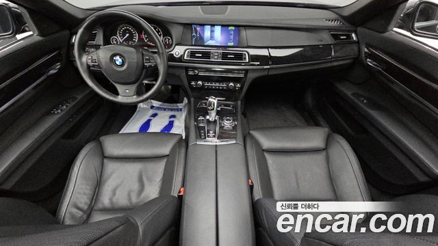 BMW 7-Series 2011 — photo 7