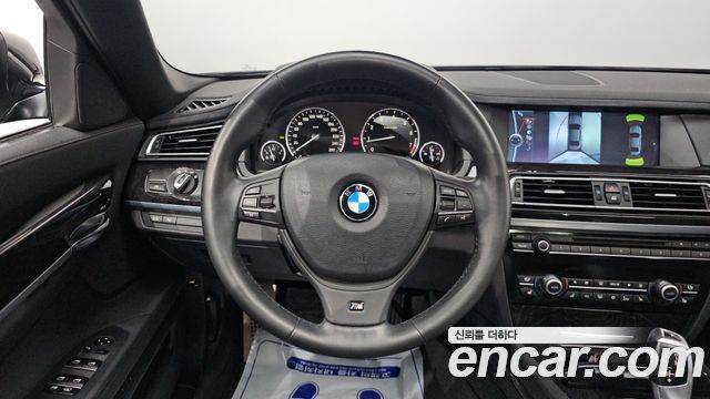 BMW 7-Series 2011 — photo 14