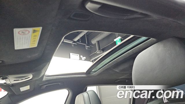 BMW 7-Series 2011 — photo 17
