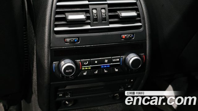 BMW 7-Series 2011 — photo 19