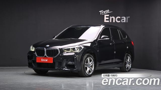 BMW X1 2021 — photo 1