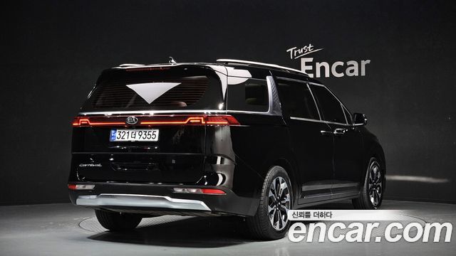 Kia Canival 2021 — photo 2