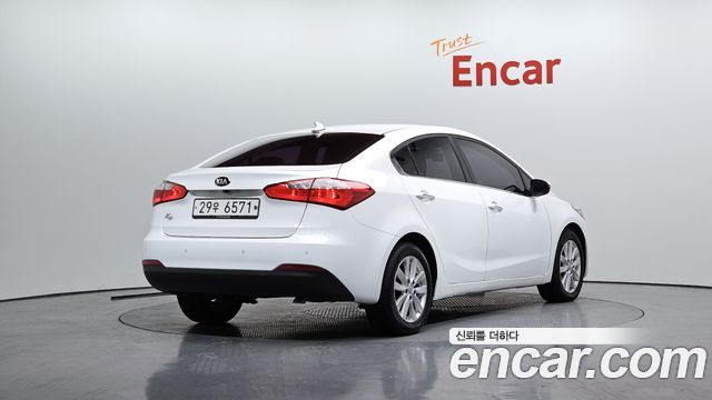 Kia K3 2014 — photo 2