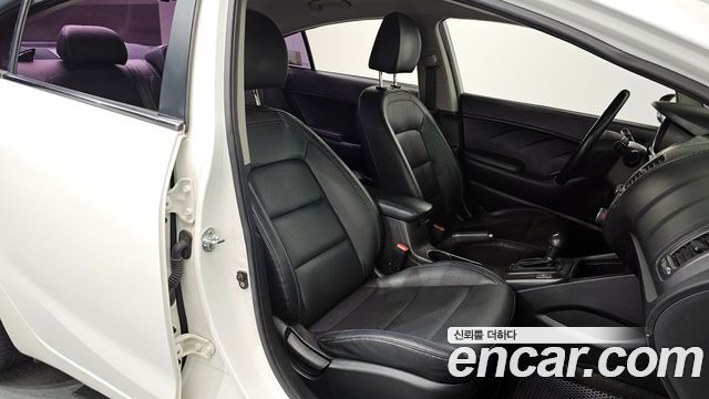 Kia K3 2014 — photo 10