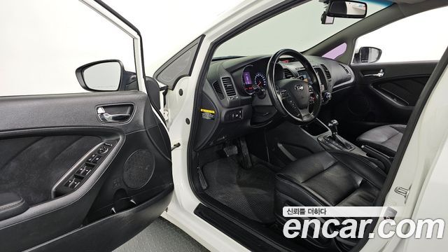 Kia K3 2014 — photo 11