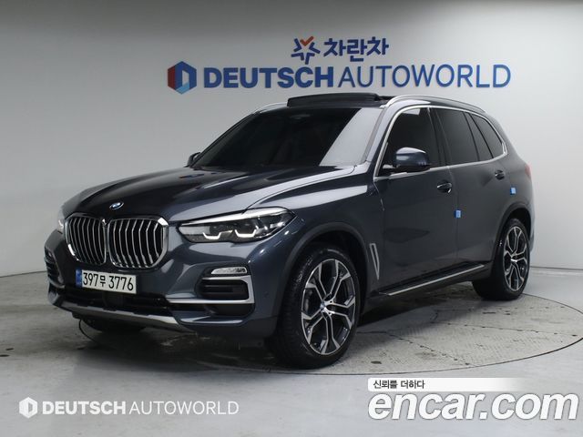 BMW X5 2021 — photo 1