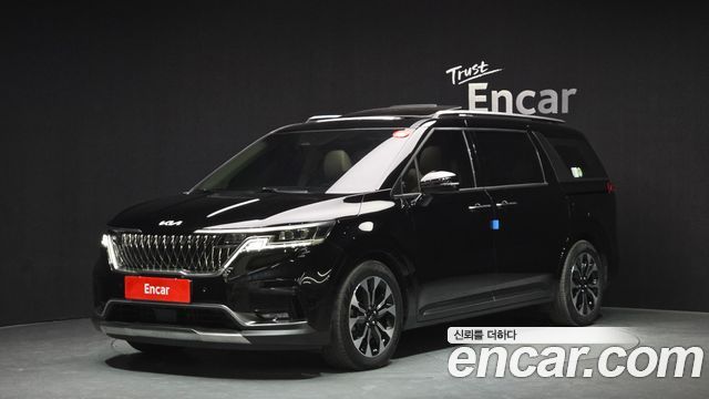 Kia Canival 2023 — photo 1