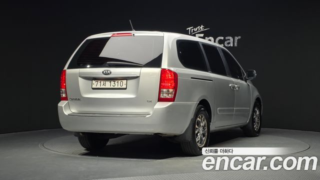 Kia Canival 2013 — photo 2