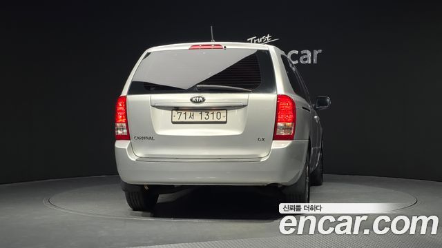 Kia Canival 2013 — photo 4