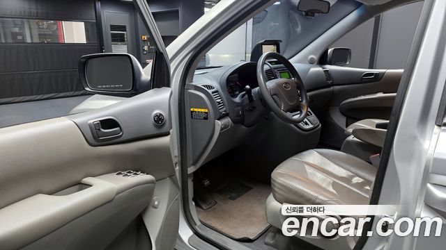 Kia Canival 2013 — photo 10