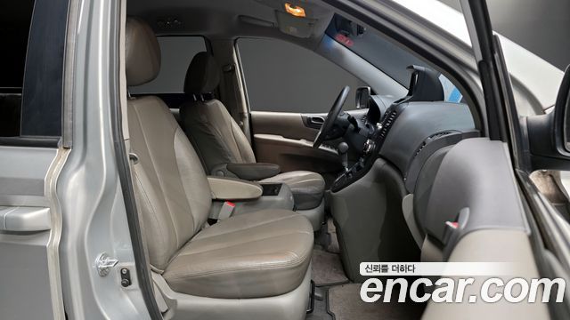 Kia Canival 2013 — photo 11