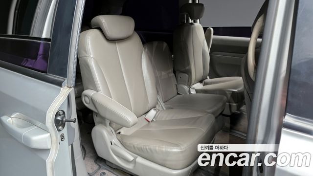 Kia Canival 2013 — photo 12