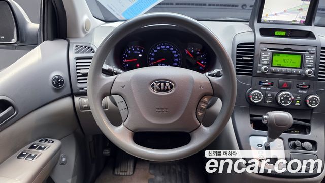 Kia Canival 2013 — photo 14