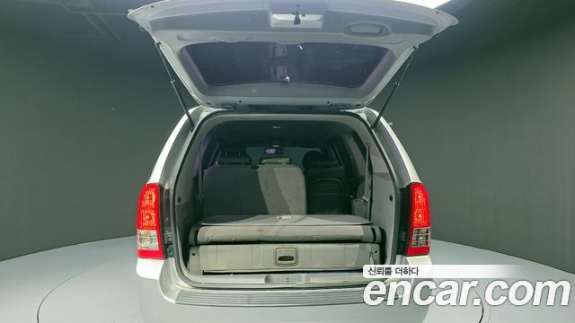 Kia Canival 2013 — photo 20