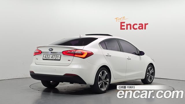 Kia K3 2013 — photo 2