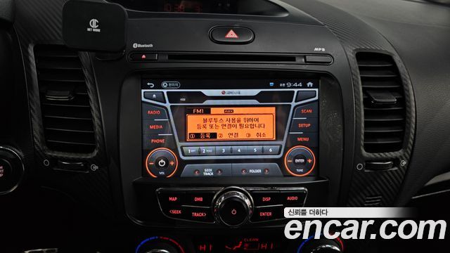Kia K3 2013 — photo 17
