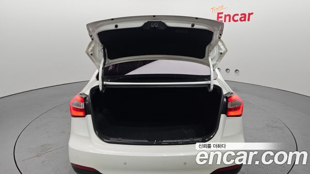 Kia K3 2013 — photo 19
