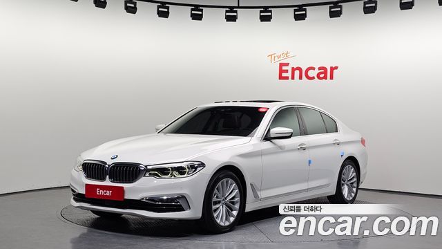 BMW 5-Series 2018 — photo 1