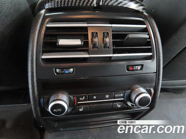 BMW 7-Series 2012 — photo 11