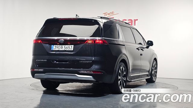 Kia Canival 2021 — photo 2