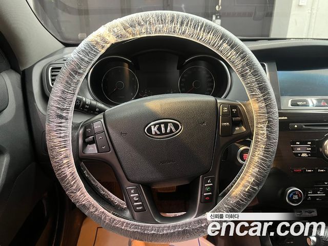 Kia K7 2012 — photo 16