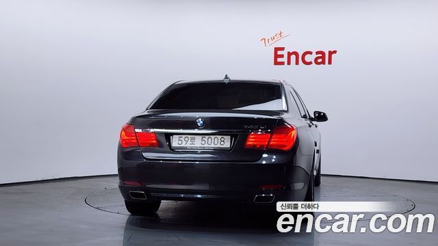 BMW 7-Series 2011 — photo 4