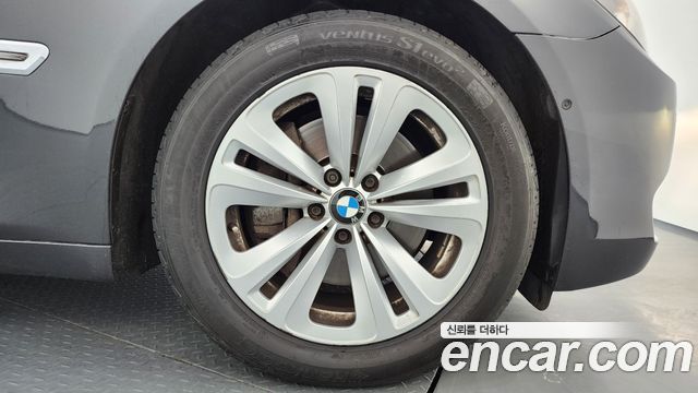 BMW 7-Series 2011 — photo 5