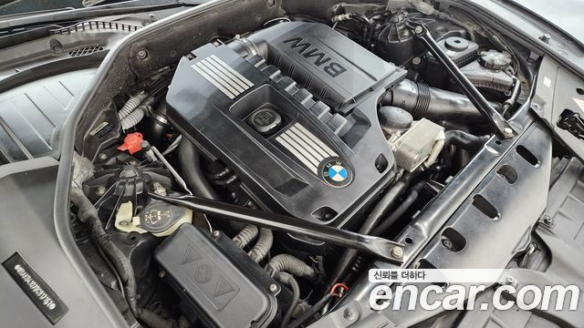 BMW 7-Series 2011 — photo 6