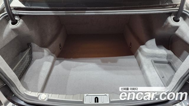 BMW 7-Series 2011 — photo 19