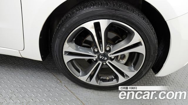 Kia K3 2013 — photo 5