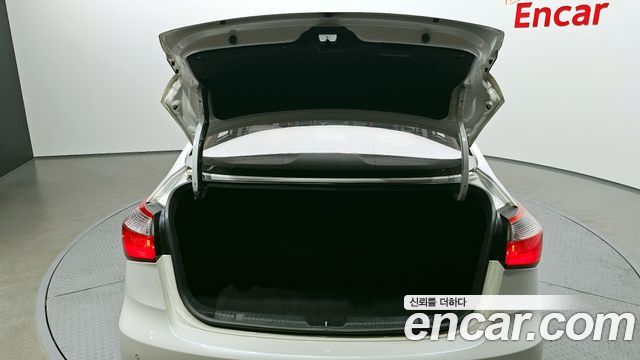 Kia K3 2013 — photo 20
