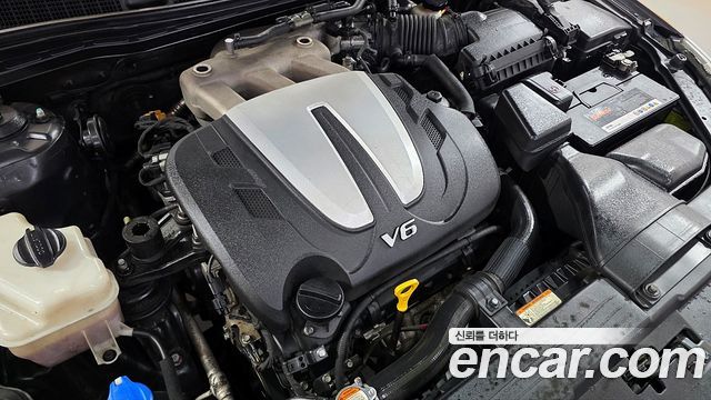 Kia K7 2012 — photo 8