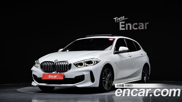 BMW 1-Series 2024 — photo 1
