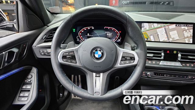 BMW 1-Series 2024 — photo 13