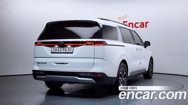 Kia Canival 2021 — photo 2