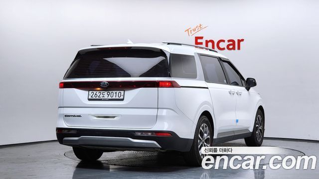 Kia Canival 2021 — photo 2