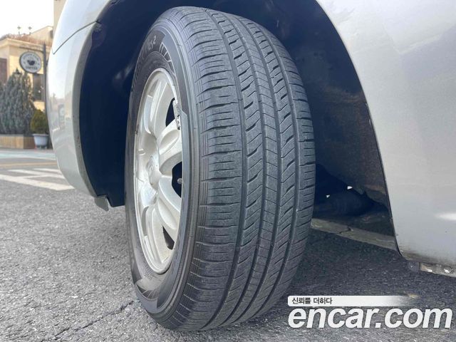 Kia Carens 2007 — photo 9