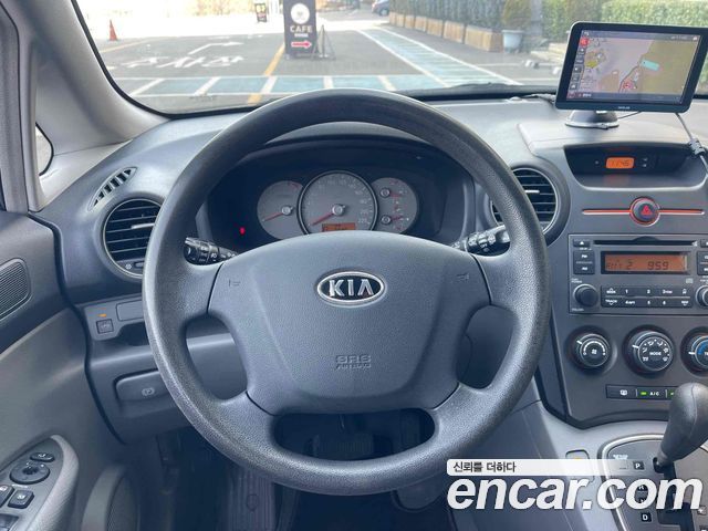 Kia Carens 2007 — photo 16