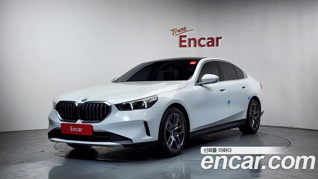 BMW 5-Series 2024 — photo 1