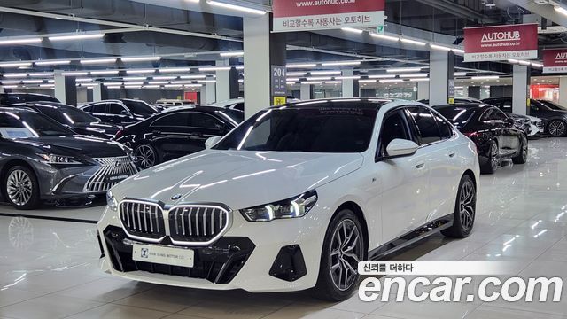 BMW 5-Series 2024 — photo 1