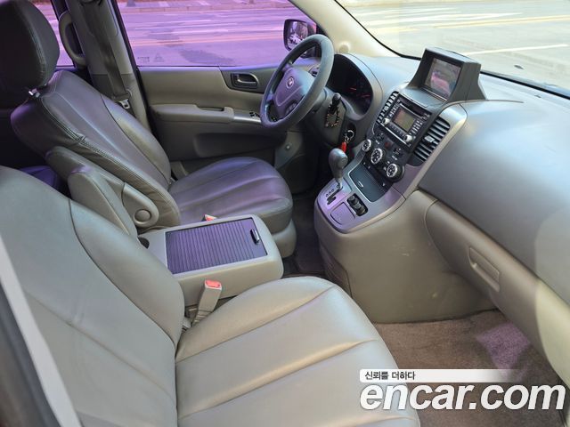 Kia Canival 2014 — photo 13