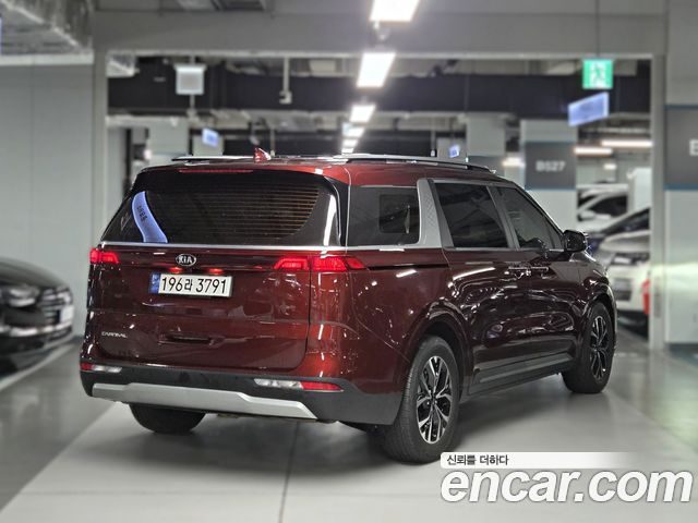 Kia Canival 2021 — photo 2