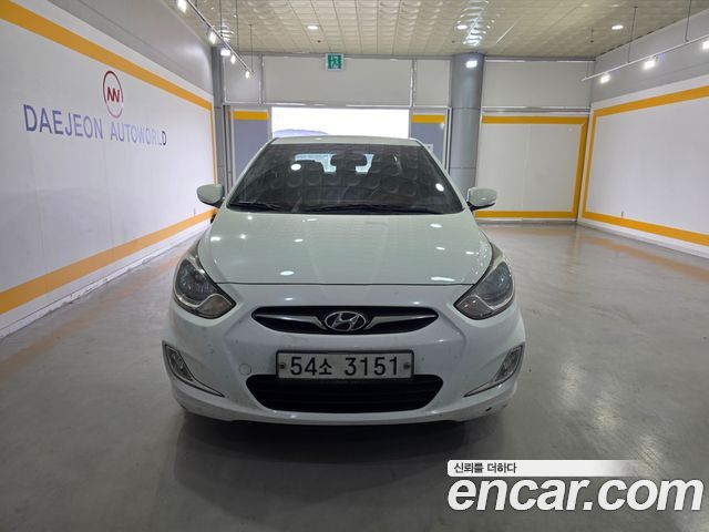 Hyundai Accent 2012 — photo 1